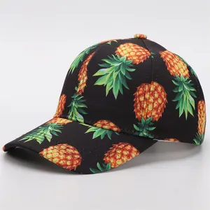 Classic black baseball cap with vibrant yellow pineapple print and curved brim style