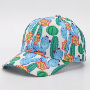 Detailed view of colorful cactus and succulent floral print on a white baseball cap