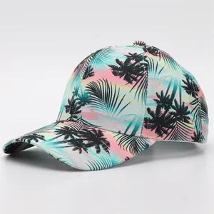 Detail of baseball cap showing gradient palm tree print and curved brim from 45-degree angle
