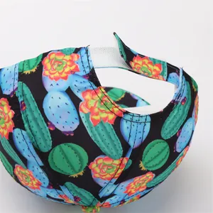 Detail of adjustable velcro strap on baseball cap with colorful succulent print