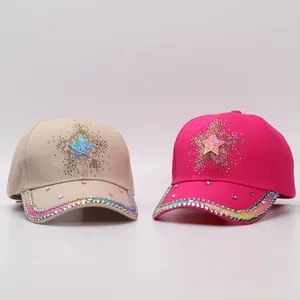 Detailed shot of gradient rhinestones and star patch on stylish baseball caps