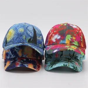 Detail view of four printed baseball caps including Van Gogh Starry Night and palm tree patterns