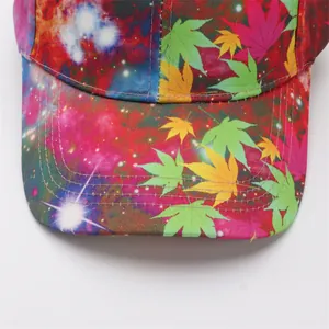 Macro shot of galaxy and maple leaf print fabric with double stitching on baseball cap