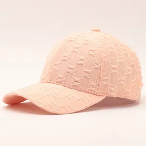 Elegant peach pink seersucker baseball cap with textured geometric fabric for women