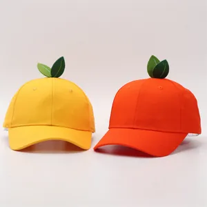 Casquettes de baseball mignonnes style fruit en jaune et orange avec décor de feuille