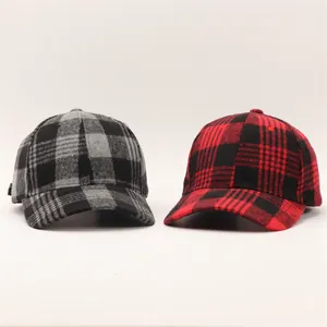 Close-up of thick wool fabric texture on houndstooth pattern baseball hats for winter
