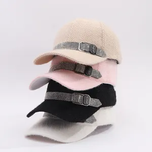Close-up of winter baseball caps with rhinestone straps and New Style metal buckles