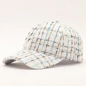Elegant tweed baseball cap with gold metallic threads and colorful woven texture