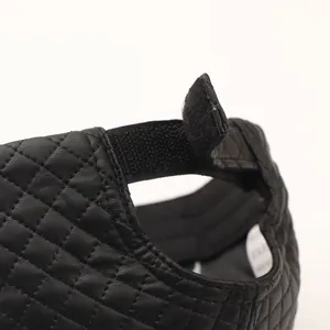 Black PU leather baseball cap with quilted diamond pattern and adjustable Velcro strap