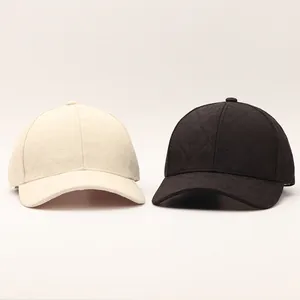 Detail shot of quilted floral embossed texture on autumn winter baseball cap