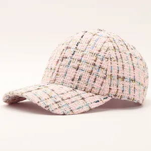 Pink tweed baseball cap with gold metallic threads and a classic six-panel structure