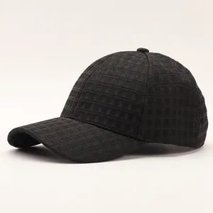 Classic black plaid baseball hat featuring a textured 3D grid design for winter warmth