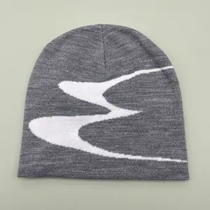 Dark grey knitted beanie with white wave pattern for winter streetwear and warmth