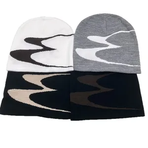 Winter knitted beanies in four contrast color styles with wave pattern jacquard