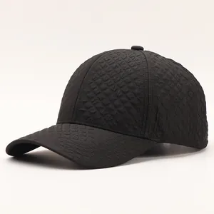 Close-up of black baseball cap featuring premium 3D embossed diamond lattice texture