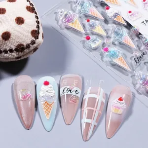 Detailed macro view of 5D embossed nail stickers featuring ice cream and cherry designs