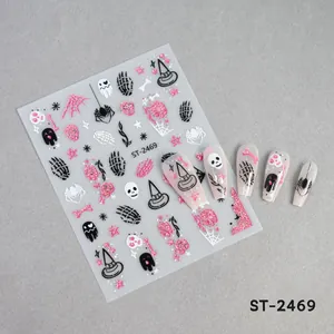 Details von rosa Glitzer Halloween Nageltattoos mit Geister-, Totenkopf- und Spinndesign