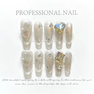 Handmade long ballerina press-on nails with silver cat-eye glitter, 3D roses and pearls