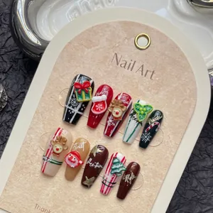 Handmade Christmas press-on nails set with 3D Santa and reindeer relief designs