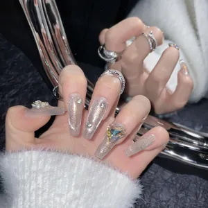 Elegant silver cat-eye press-on nails with luxury rhinestones and heart-shaped gemstone