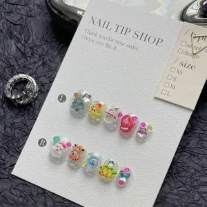 Detailed set of Christmas press-on nails with 3D Santa and reindeer relief designs