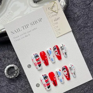 Detailed view of handmade press-on nails featuring traditional Peking Opera mask art