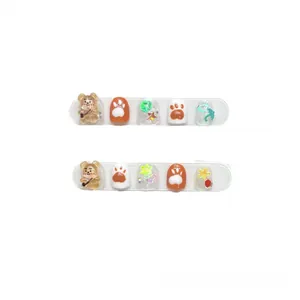 Set of 10 reusable children nails featuring 3D brown bears and cute orange cat paws