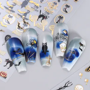 Autocollants nail art Halloween dorés avec motifs araignées et squelettes sur ongles