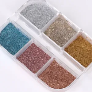 Detailed view of 6-grid nail mirror powder set with metallic silver and gold shimmer