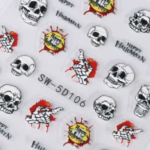 Macro view of 5D embossed Halloween nail stickers with skull and bone motifs
