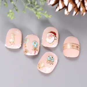 Detailed Christmas press-on nails with golden Santa, reindeer and 3D snow textures