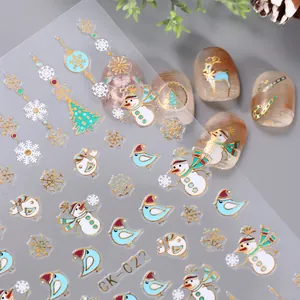 Detail of Christmas nail stickers CK-022 with gold embossed reindeer and snowflakes