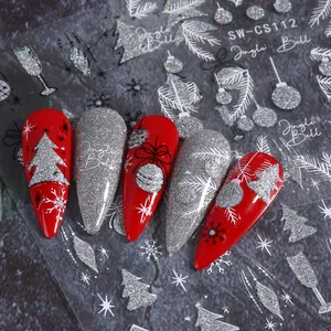 Christmas nail art stickers featuring silver glitter trees and snowflakes on red nails