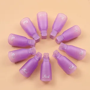 Set de diez clips morados traslúcidos para quitar esmalte dispuestos en círculo