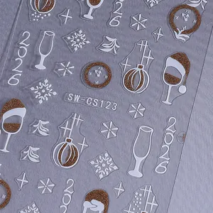3D gold glitter Christmas nail stickers featuring snowflakes and 2026 New Year patterns