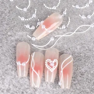 5D embossed white pearl chain nail stickers with heart patterns on pink gradient nails