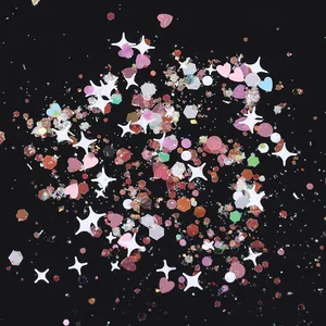 Sparkly mixed nail art glitter set with heart, star, and geometric shapes in pink and pearl