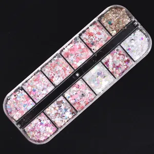 Close-up of 12-grid pink holographic nail sequins with star and heart glitter shapes