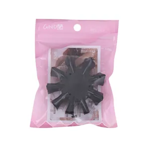 Set of 5 black nail practice holders in pink translucent packaging with instructions