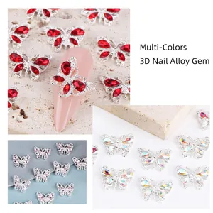 Macro shot of 3D alloy butterfly nail charms with multicolored crystals and rhinestones