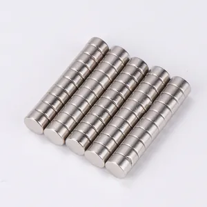 Macro shot of silver cylindrical neodymium magnets stacked in rows for cat eye nail art