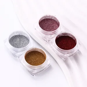 Detail view of 4-piece nail chrome powder set with rose red and gold metallic pigments