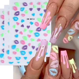 Detailed view of 3D glitter heart and lip nail stickers with real manicure effect
