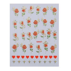 3D nail stickers SWA07 with red roses, golden outlines, hearts and gold starburst patterns