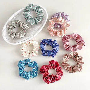 Set di elastici per capelli in raso floreale in colori pastello per acconciature