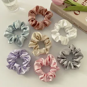 Set of 7 colorful satin scrunchies in silk-like fabric for French ponytail styling