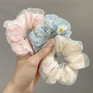 Three-piece set of floral and daisy double-layer mesh scrunchies for bun hairstyles