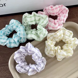 Fresh plaid scrunchies set in five pastel colors including blue, green, and pink