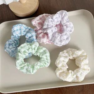 Five-pack of sweet plaid scrunchies in pastel macarons colors for hair styling
