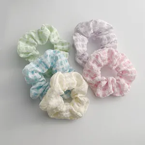 Set of 5 pastel seersucker plaid scrunchies in mint, lavender, blue, pink, and ivory